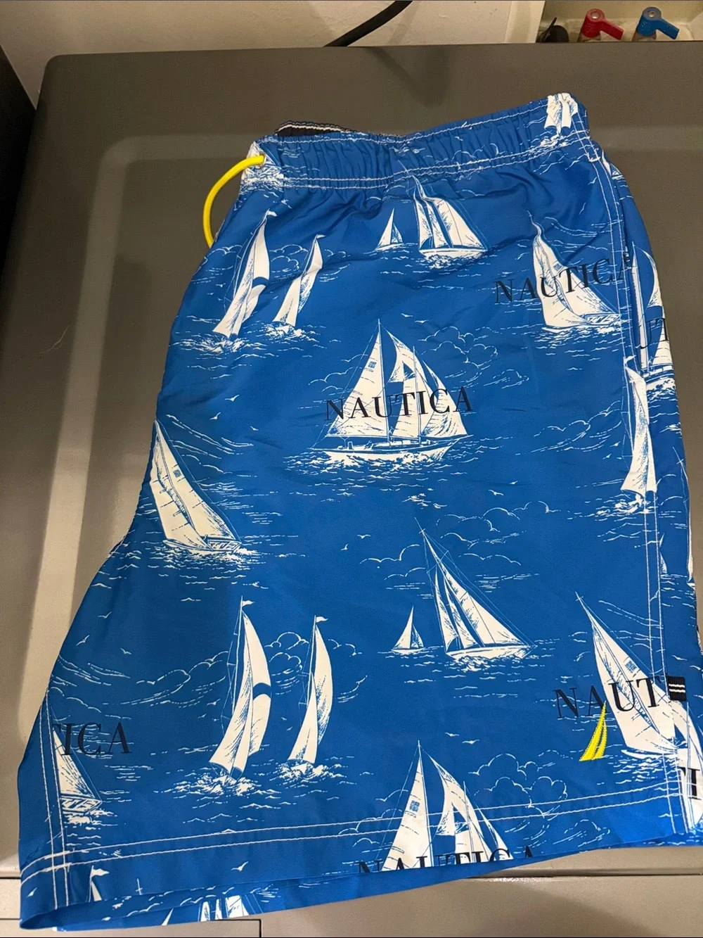 Nautica Blue Sailboat Print Swim Shorts with Yellow Drawstring